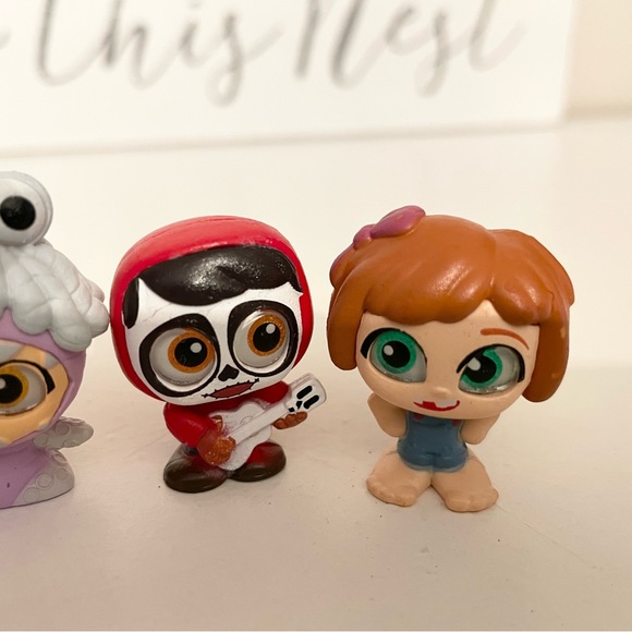 FREE w/purchase Pixar doorables | Young Carl & Ellie , Remy , Boo , Miguel - Picture 5 of 5